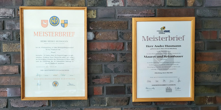 Meisterbriefe von Andre Husmann und Heiko Husmann.